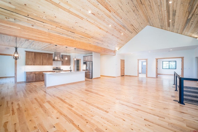 26217 Rd 38.5, Dolores, CO 81323 - unfurnished living room featuring light wood-style flooring, high vaulted ceiling, wooden ceiling, a sink, and recessed lighting