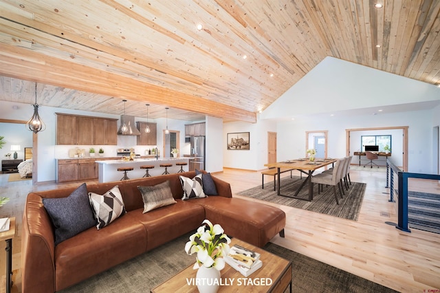 26217 Rd 38.5, Dolores, CO 81323 - living room with wood ceiling, high vaulted ceiling, light wood finished floors, and recessed lighting