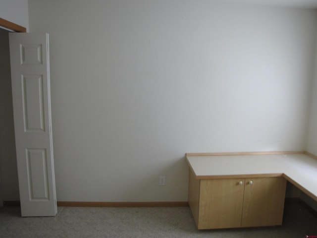 1770 Stellar Pl, Montrose, CO 81401 - unfurnished office with light carpet and baseboards