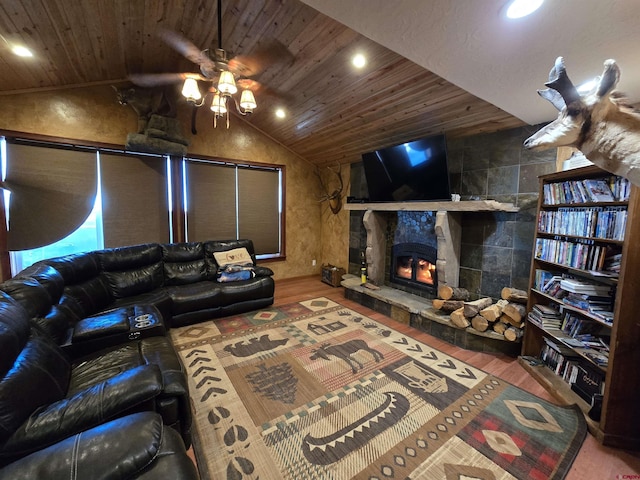 4189 Crowther Ln, Alamosa, CO 81101 - living area with wood ceiling, ceiling fan, wood finished floors, lofted ceiling, and a stone fireplace