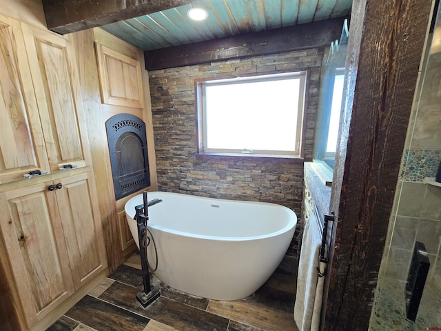 4189 Crowther Ln, Alamosa, CO 81101 - full bathroom with a freestanding tub, wood finished floors, and wood ceiling