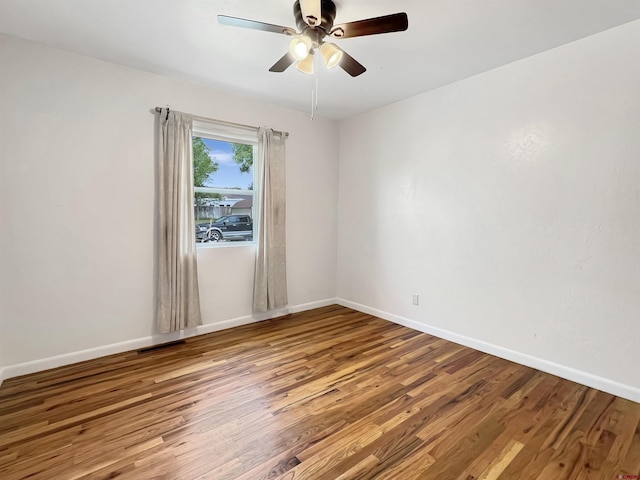214 S Valley, Cortez, CO 81321 - spare room with wood finished floors, baseboards, and ceiling fan