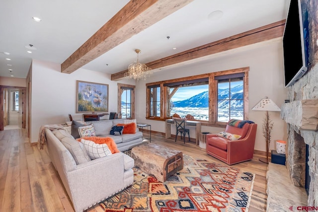 426 Saddle Ridge Ranch Rd, Crested Butte, CO 81224 - living room with baseboards, light wood-style floors, a chandelier, beamed ceiling, and recessed lighting