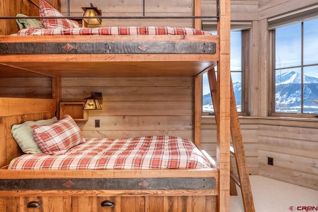 426 Saddle Ridge Ranch Rd, Crested Butte, CO 81224 - bedroom with wooden walls and multiple windows