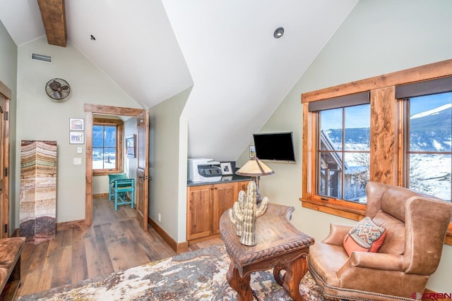 426 Saddle Ridge Ranch Rd, Crested Butte, CO 81224 - sitting room with light wood-type flooring, beam ceiling, baseboards, and high vaulted ceiling