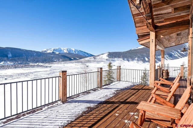426 Saddle Ridge Ranch Rd, Crested Butte, CO 81224 - snow covered deck with a mountain view