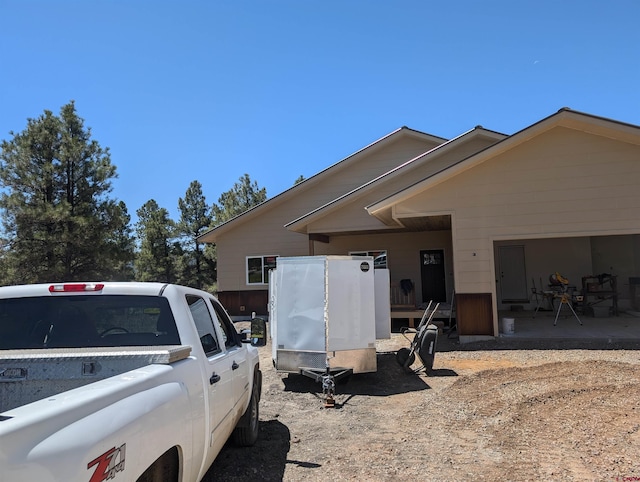 54 Lakewood St, Pagosa Springs, CO 81147 - view of side of home featuring a garage