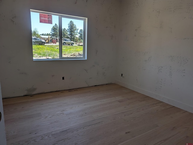 54 Lakewood St, Pagosa Springs, CO 81147 - empty room with wood finished floors and baseboards