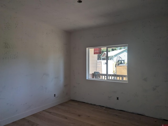 54 Lakewood St, Pagosa Springs, CO 81147 - empty room with wood finished floors and baseboards