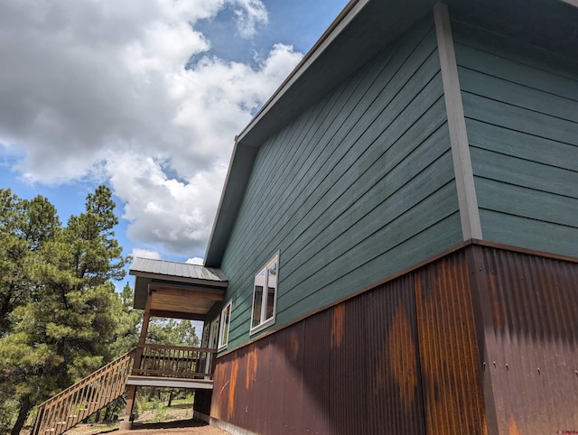 54 Lakewood St, Pagosa Springs, CO 81147 - view of side of home featuring stairway