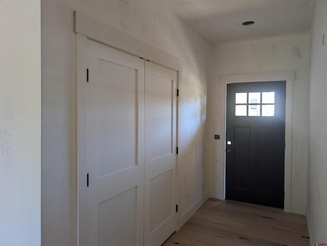 54 Lakewood St, Pagosa Springs, CO 81147 - doorway to outside featuring light wood-style floors