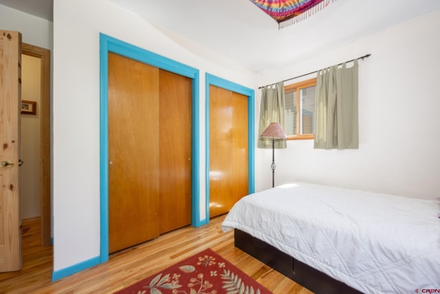 3515 Bennett St, Durango, CO 81301 - bedroom featuring multiple closets and wood finished floors