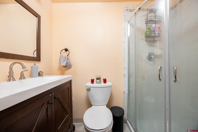 3515 Bennett St, Durango, CO 81301 - bathroom featuring toilet, vanity, and a stall shower