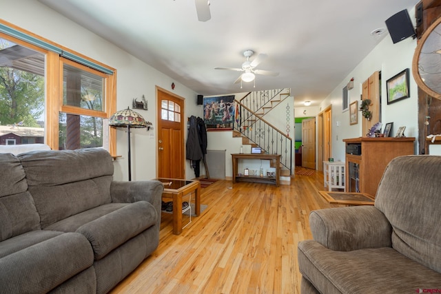 3515 Bennett St, Durango, CO 81301 - living area with ceiling fan, stairs, and light wood finished floors