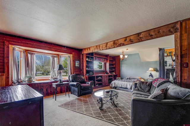 399 E Schroder Dr, Bayfield, CO 81122 - living room with a textured ceiling, carpet, and a chandelier