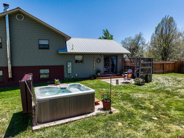 399 E Schroder Dr, Bayfield, CO 81122 - rear view of property featuring a hot tub and metal roof