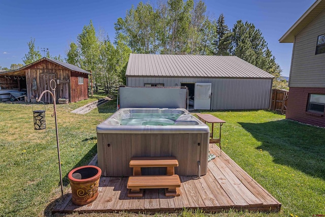 399 E Schroder Dr, Bayfield, CO 81122 - view of grassy yard featuring a hot tub, a deck, and an outdoor structure