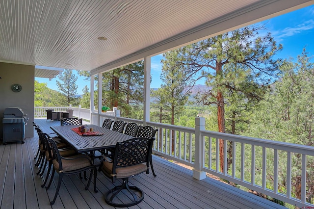 575 County Rd 253, Durango, CO 81301 - deck with outdoor dining area, a mountain view, and area for grilling