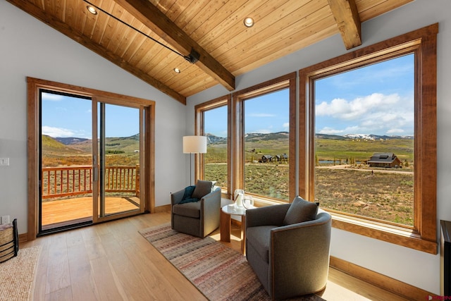 64 Buckhorn Way, Crested Butte, CO 81224 - sitting room featuring a mountain view, wood ceiling, baseboards, light wood-type flooring, and recessed lighting