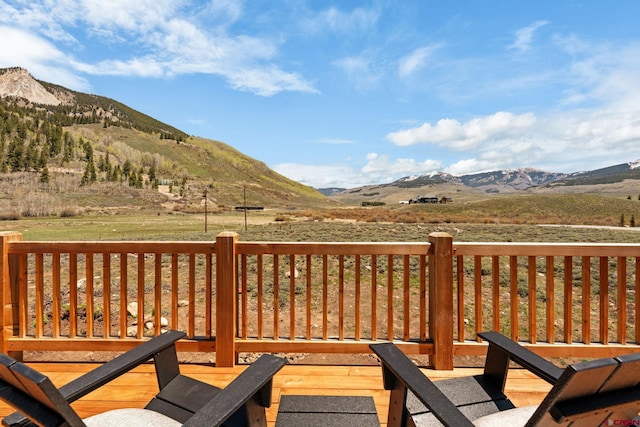 64 Buckhorn Way, Crested Butte, CO 81224 - wooden deck featuring a mountain view