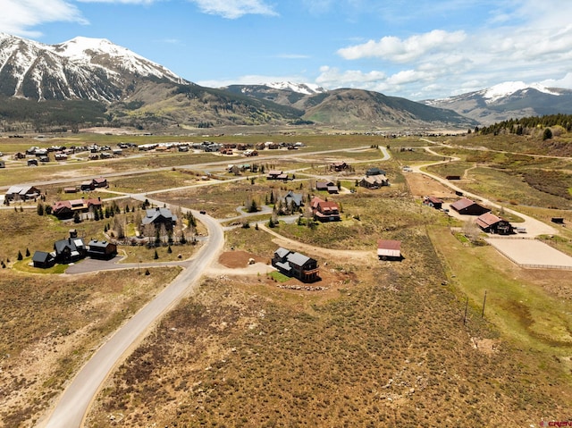 64 Buckhorn Way, Crested Butte, CO 81224 - aerial view of property and surrounding area with a mountainous background