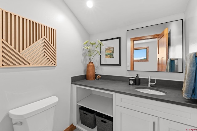 64 Buckhorn Way, Crested Butte, CO 81224 - half bath featuring toilet, vanity, and lofted ceiling