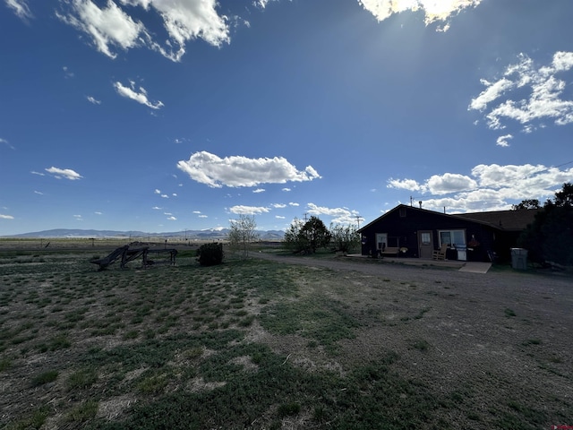 6477 W County Road 9n, Del Norte, CO 81132 - view of yard with a patio and a rural view