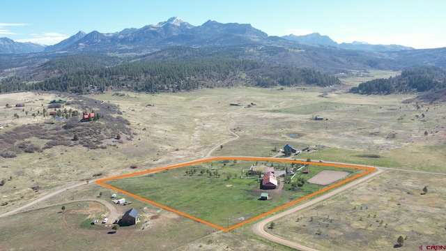 541 Perry Dr, Pagosa Springs, CO 81147 - overview of rural landscape featuring property boundaries highlighted and a mountain backdrop