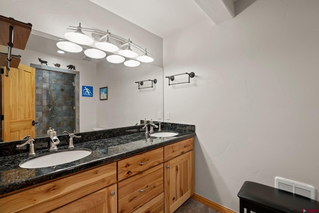 50 W Durango Ridge Rd, Durango, CO 81301 - full bath featuring double vanity, a stall shower, baseboards, and tile patterned flooring
