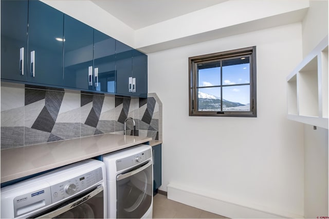 6 Moon Ridge Ln, Crested Butte, CO 81224 - washroom with washer and dryer and light tile patterned floors