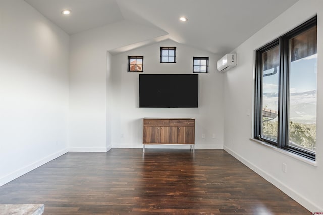 182 Juniper Rd S, Ridgway, CO 81432 - unfurnished living room with lofted ceiling, an AC wall unit, wood finished floors, baseboards, and recessed lighting