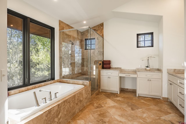 182 Juniper Rd S, Ridgway, CO 81432 - full bathroom featuring healthy amount of natural light, a garden tub, a shower stall, vanity, and recessed lighting