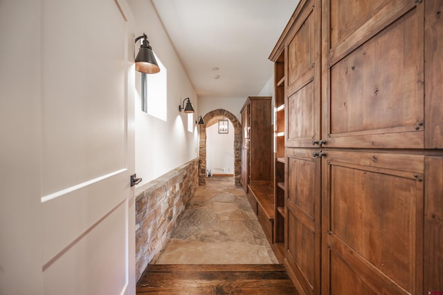 182 Juniper Rd S, Ridgway, CO 81432 - hall with stone tile flooring and arched walkways