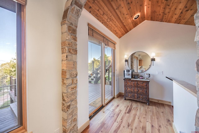 182 Juniper Rd S, Ridgway, CO 81432 - entryway with wood ceiling, lofted ceiling, wood finished floors, ornate columns, and baseboards