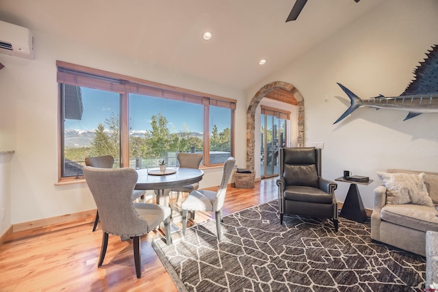 182 Juniper Rd S, Ridgway, CO 81432 - dining space with a wall mounted air conditioner, recessed lighting, wood finished floors, vaulted ceiling, and a ceiling fan