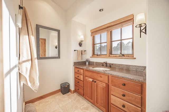 182 Juniper Rd S, Ridgway, CO 81432 - bathroom with tile patterned flooring, vanity, and baseboards