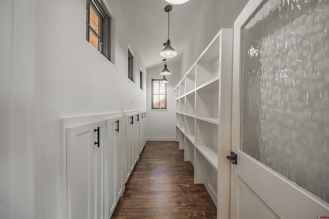 182 Juniper Rd S, Ridgway, CO 81432 - hall featuring dark wood finished floors, a towering ceiling, and baseboards