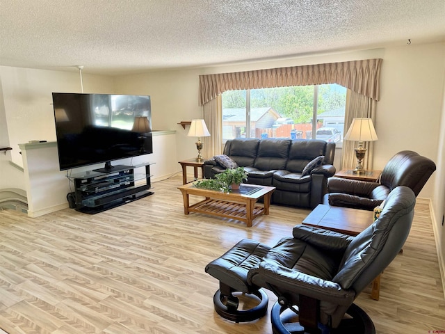 2020 Essex St, Montrose, CO 81401 - living room featuring a textured ceiling and wood finished floors