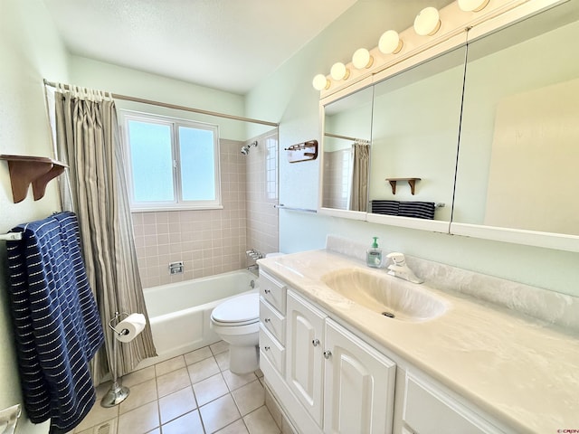 2020 Essex St, Montrose, CO 81401 - full bath featuring vanity, shower / tub combo with curtain, tile patterned floors, and toilet