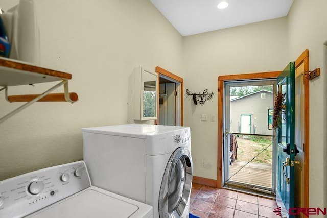 538 Rugby Mines Rd, Walsenburg, CO 81089 - laundry room featuring washer and dryer, healthy amount of natural light, tile patterned flooring, and baseboards
