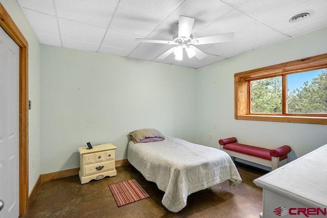 538 Rugby Mines Rd, Walsenburg, CO 81089 - bedroom with a drop ceiling, baseboards, and ceiling fan