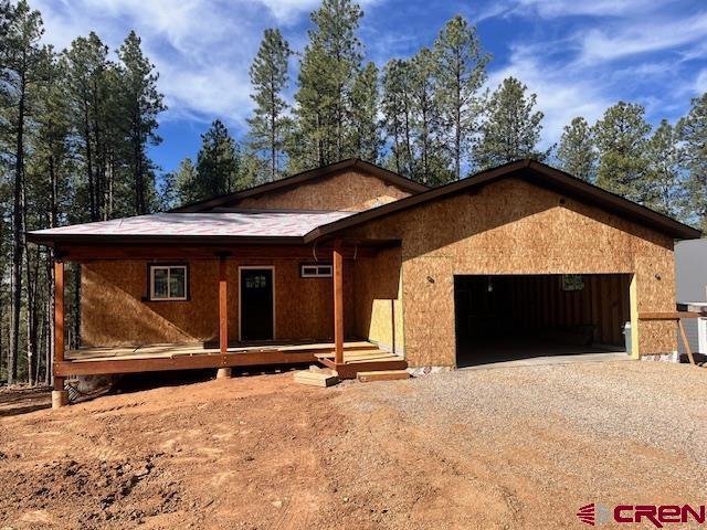 86 Spruce Way, Bayfield, CO 81122 - view of front of home with driveway and a garage