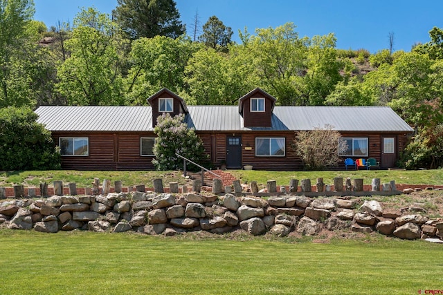 5711 County Road 203, Durango, CO 81301 - view of front facade with a front lawn, metal roof, and log siding