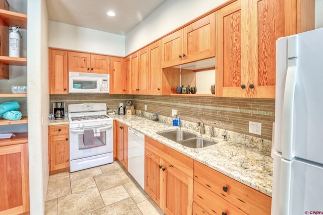 520B Whispering Wood Dr, Pagosa Springs, CO 81147 - kitchen featuring white appliances, a sink, open shelves, backsplash, and light stone countertops