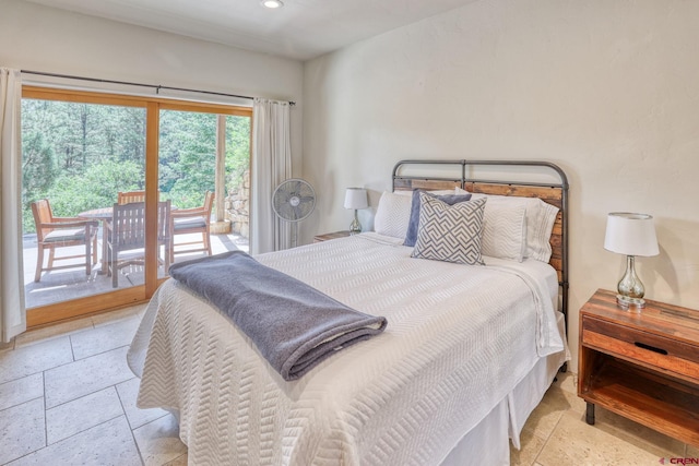 520B Whispering Wood Dr, Pagosa Springs, CO 81147 - bedroom with access to outside, stone tile flooring, and recessed lighting