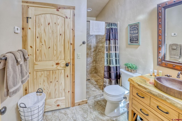 520B Whispering Wood Dr, Pagosa Springs, CO 81147 - full bathroom with vanity, a tile shower, and toilet