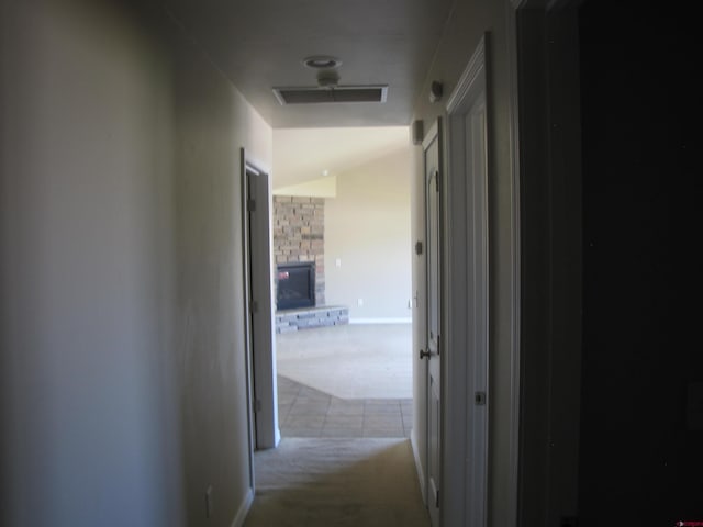 1756 Freedom Way, Montrose, CO 81401 - hall featuring carpet, baseboards, and tile patterned flooring