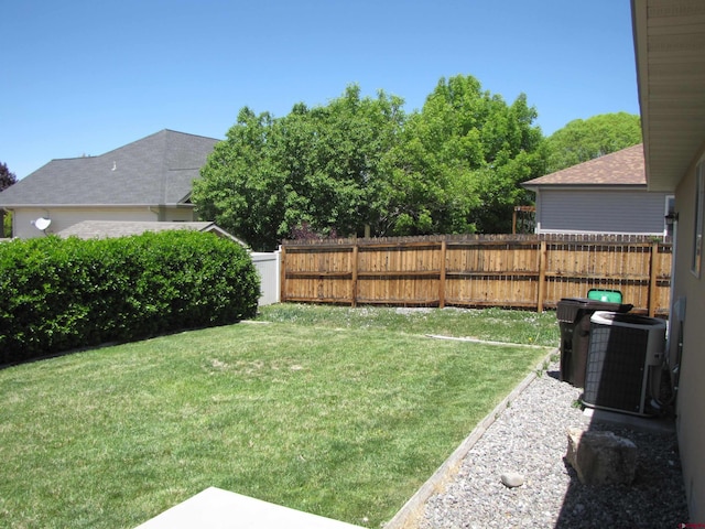 1756 Freedom Way, Montrose, CO 81401 - view of yard featuring central AC