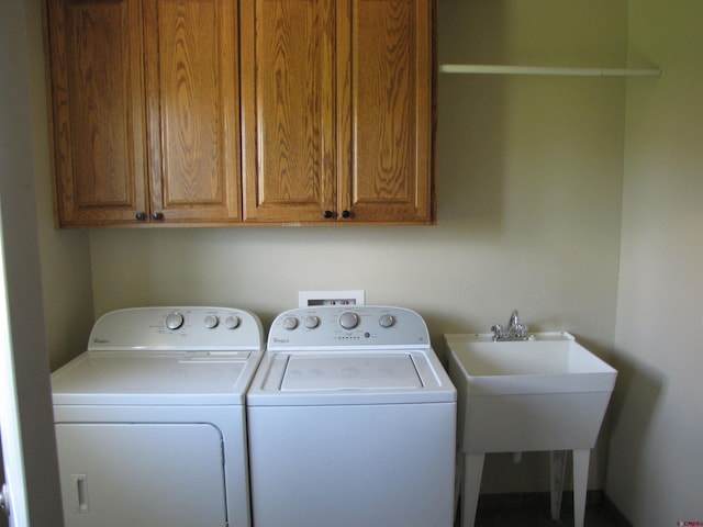 1756 Freedom Way, Montrose, CO 81401 - washroom featuring washing machine and dryer and cabinet space