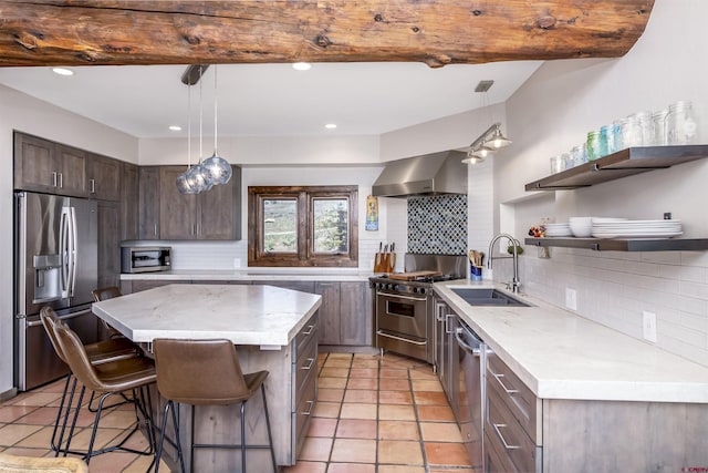 156 Zeligman St, Crested Butte, CO 81224 - kitchen with stainless steel appliances, a sink, wall chimney range hood, backsplash, and recessed lighting